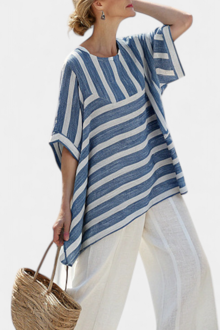 Ornella – top blu sofisticato a righe e pantaloni con dettagli al fondo
